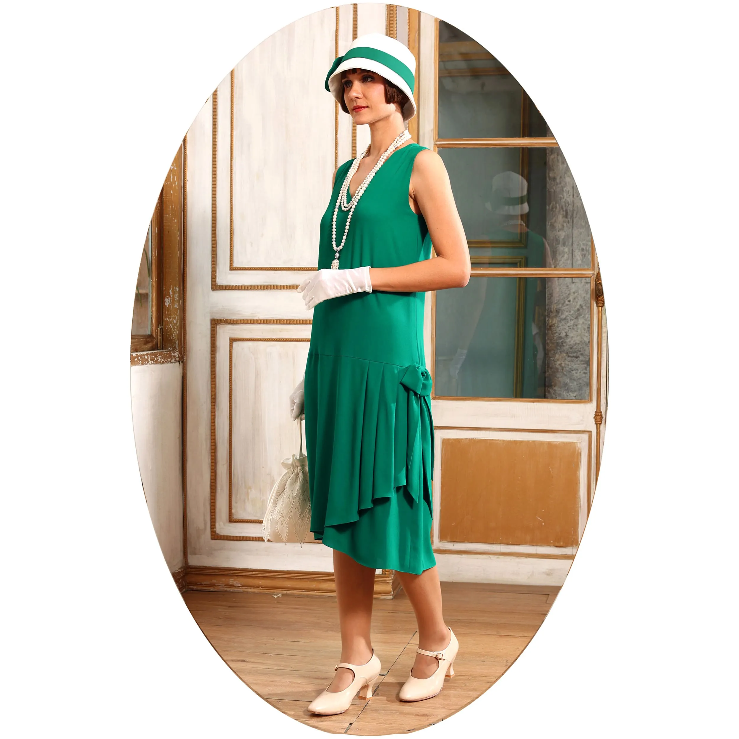1920s-inspired flapper dress in green with drape and bow