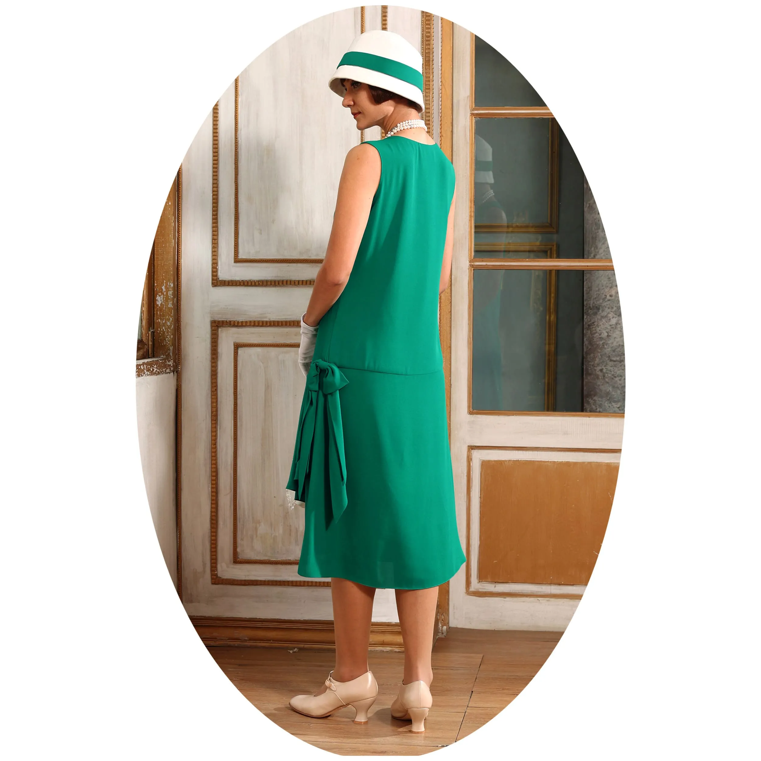 1920s-inspired flapper dress in green with drape and bow